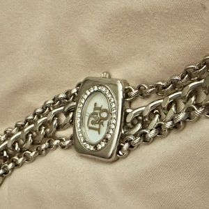 Silver Dior watch - 2 little stones missing. Like new